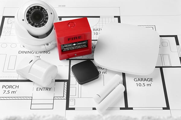 Residential alarm system devices: surveillance cameras, motion detectors, carbon monoxide detectors, and fire/smoke sensors. 